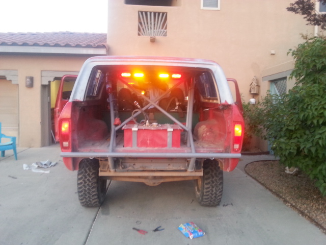 Light bar all lit up, the middle light is blue