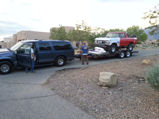 Wife's car pulling the bronco.