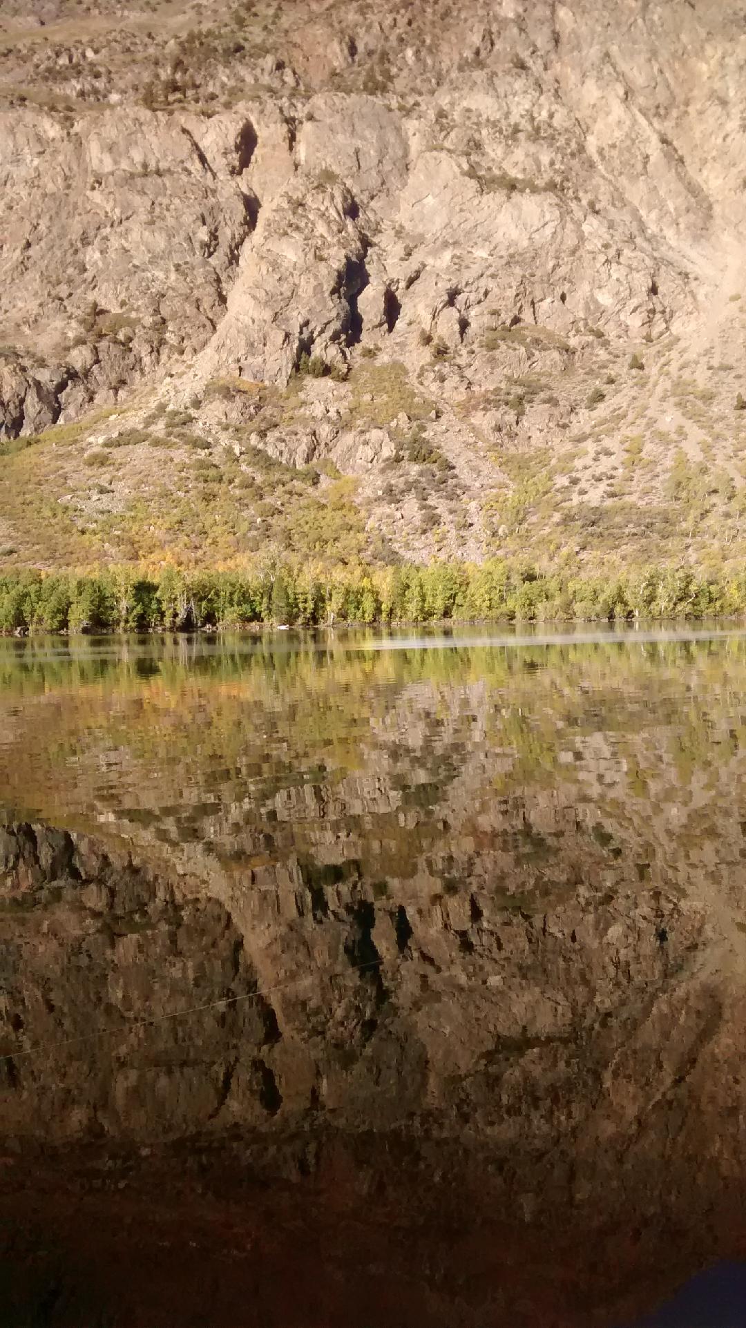 It hard to see in the pic, but I've never seen anything like this and it was way better in person. Kind of a rainbow on the water from the early morning fog I'm guessing. It was pretty bitchen!