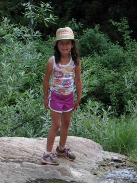 The little one (and only one other than me to make the short rock climb to the pond.