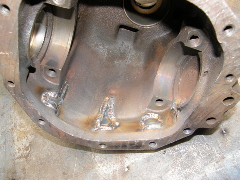 The stud boss' from the inside.  Had to weld them up for strenght and to help seal the housing.