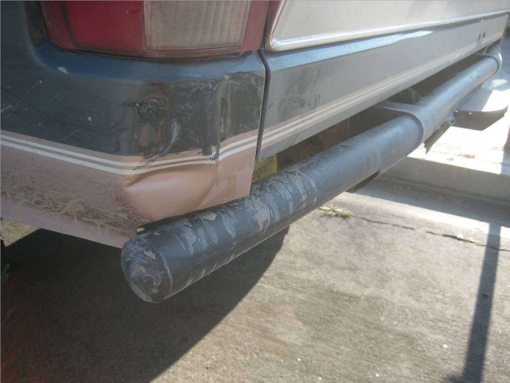 dent above bumper.JPG